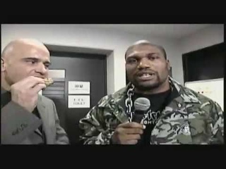 Bas Rutten steals Quinton Rampage Jackson's chicken!! - SERIOUS PIMP Camo Jacket
