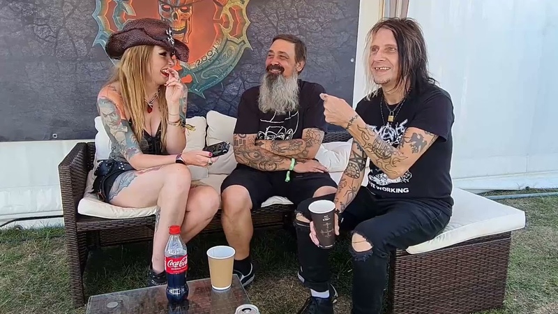 Eye Hate God hanging with Hayley Leggs for Total Rock at Bloodstock